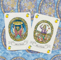 tarot kortos su spalvingomis Lord of Platters ir Lady of Platters iliustracijomis, kriaušių ikonėlės kampuose ir mėlynu ornamentuotu fonu