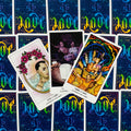 tarot kortos fanuotos trijulė su 'Five of Cups' ir 'Three of Cups' iliustracijomis ant spalvingų nugarėlių