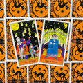 tarot kortos Halloween tematikos rinkinys su dviem atverstomis kortomis Ten of Ghosts ir Nine of Ghosts bei oranžinėmis nugarėlėmis