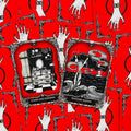 Tarot kortos raudonomis nugarėlėmis, dvi atvertos kortos Cures and Remedies ir Weather Magick, detali juoda‑balta iliustracija