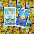 tarot kortos su ryškiais mėlynais ir auksiniais motyvais, priekyje Ace of Cups ir Two of Cups, išdėstytos ant dekoratyvinių nugarėlių fono
