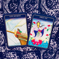 tarot kortos – atverstos dvi kortos „Life Journey“ ir „Kwan Yin“, tamsiai mėlynos nugarėlės, žiūrima iš viršaus