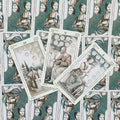 tarot kortos Pentacles komplektas su žaliomis nugarėlėmis, trijų kortų (8–10) priekinių pusių išdėstymas pirkimo puslapyje