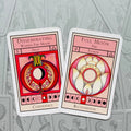 Oracle kortos: dvi rožinė–raudonos spalvos kortos (Disseminating/Waning Fire Moon ir Full Moon), arti, matomi žodžiai Confidence ir Recognition