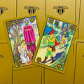 tarot kortos Symbolon, dvi spalvingos kortos su medžio ir gandro siužetais ant aukso dėžučių fono
