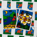tarot kortos dviejų kortų rinkinys, spalvingos liaudiškos iliustracijos su mėnuliu, kalnais ir auksinėmis monetomis