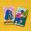 tarot kortos su moderniomis šešių ir septynių kardų iliustracijomis, ryškūs spalvoti dizainai ir geltona nugarėlė