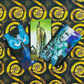 Tarot kortos fanuotos trimis unikaliomis iliustruotomis kortomis (žalio, mėlyno, turkio) ant geltonai juodos spiralės nugarėlės