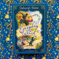 Tarot kortos Everyday Witch – mėlynas iliustruotas dėklas su raganos ir katės piešiniu, priekine puse