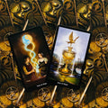 tarot kortos Steampunk rinkinys, centre parodytos Ace of Cups ir Two of Cups kortos su auksine mechanine nugarėle