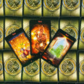 Tarot kortos Wands: trys atverstos kortos (4, 5, 6) su ugniniais oranžiniais motyvais ir žalvario nugarėlių raštu