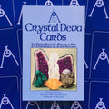 Crystal Deva kortos mėlyname dėkle, parodytas priekinis dangtis su kristalų iliustracija ir autoriaus Cindy Watlington vardu