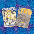 tarot kortos rinkinys su kortomis 19 Hieros Gamos ir 18 Heaven’s Gate, spalvotos iliustracijos ant mėlyno ornamentinio fono