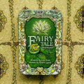 Lenormand kortų rinkinys Fairy Tale metalinėje žalia dėžutėje su lelija ir varlė ant dangčio, matomas priekis