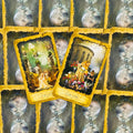 tarot kortos – atverstos 6 ir 7 taurės kortos su geltonais rėmeliais, išdėstytos ant mėnulio nugarėlių fono