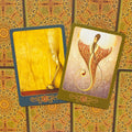 Tarot kortos, dviejų veidų variantų komplektas su geltonai auksinėmis iliustracijomis (32, 33) ir ornamentiniu galiniu dizainu
