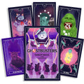 Ghostbusters tarot kortos ir vadovas, violetinė dėžutė su pagrindiniu viršeliu ir keliomis atverstomis kortomis