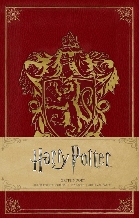 Gryffindor užrašų knygelė tamsiai raudonu dirbtinės odos viršeliu su auksiniu erelio herbu, kišeninio formato