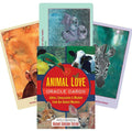 Animal Love orakulų kortos, Nadine Gordon‑Taylor iliustruotas rinkinys su ryškiu dangteliu ir keliais fanuotais gyvūnų kortų pavyzdžiais (zebra, karvė, lapė)