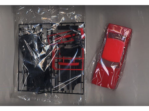 Aoshima Nissan Skyline 2000GT-X Ken & Mary 4 durų 1/24 surinkamas rinkinys