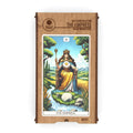 Medinė dėlionė The Empress (250 det.) pakuotės priekinė dalis su spalvinga tarot kortos iliustracija ir medine dėžute
