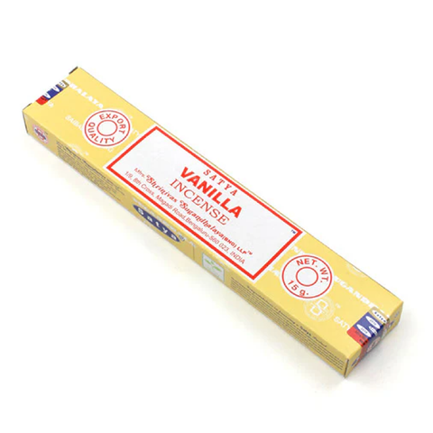 Smilkalai Satya Vanilla 15 g geltonėje pakuotėje, kampu parodyta priekinė etiketė ir nurodytas svoris