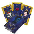 Tarot kortos Frida Kahlo mėlyna dėžutė su trimis atverstomis kortomis priekyje, ryškios aukso ir raudonos iliustracijos
