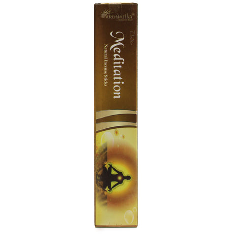 Smilkalai Aromatika Meditation rudi–auksiniai 20 cm pakuotėje, skirti meditacijai, pakuotėje matomas medituojantis siluetas