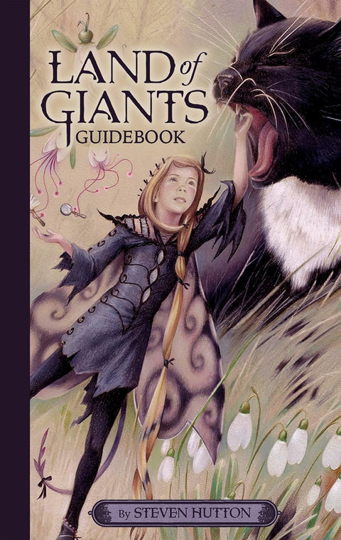 Knyga Land of Giants guidebook: iliustruotas priekinis viršelis su mergaitės ir milžino katės scena, autorius Steven Hutton
