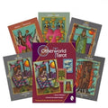 Tarot kortos Otherworld komplektas — dėžutė ir keli skirtingi ryškūs iliustruoti kortų pavyzdžiai parduotuvės galerijoje