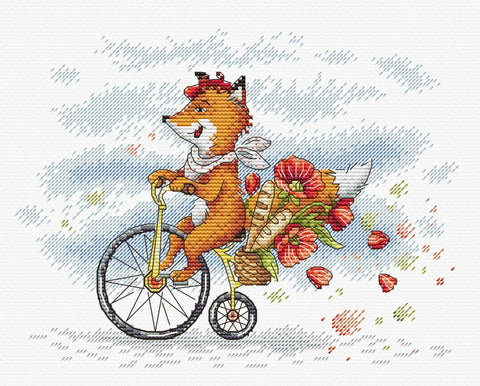 kryželių rinkinys: oranžinė lapė važiuoja ant retro dviračio, pintinėje raudonos aguonos ir duonos kepalai, aiškiai matoma siūlų tekstūra ir spalvų derinys