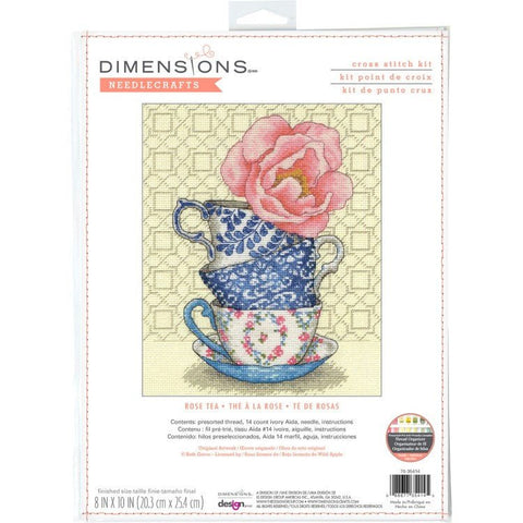 Kryželių rinkinys Dimensions "Rose Tea" (20×25 cm) pakuotėje, parodytas rožinės rožės ir mėlynų raštuotų arbatos puodelių dizainas