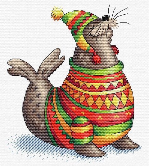 Plakatas su linksmu ruoniu priekiniame plane, dėvinčiu ryškų žaliai-raudoną raštuotą megztinį ir kepurę