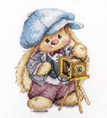 Kryželių rinkinys su zuikučiu fotografu, pastelinės spalvos, detalus modelio motyvas su senoviniu fotoaparatu