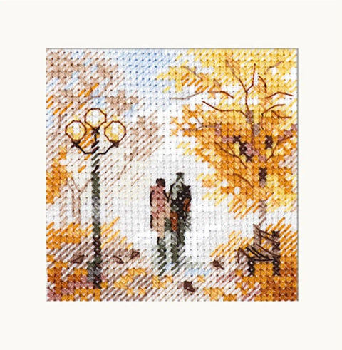Kryželių rinkinys 20×20 cm: rudeniška parko scena su pora prie žibinto, geltonais lapais ir suoliuku