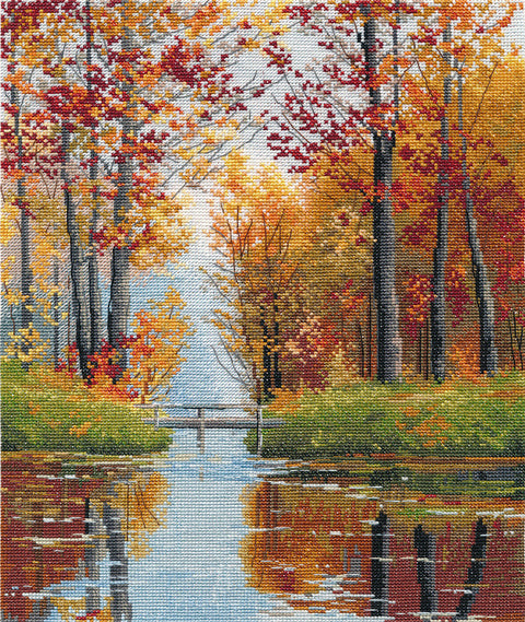 siuvinėjimo rinkinys rudeniškas ežero peizažas 40×50 cm su geltonų ir raudonų lapų motyvais ir mediniu tiltelio akcentu