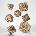 RPG kauliukai 7 dalių rinkinys, smėlio spalvos su rudais steampunk skaičių ornamentais, plaukiojančiu išdėstymu