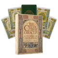 Celtic Tree Oracle kortos: komplekte stilinga dėžutė ir išskleistos žaliai‑auksinės kortos, iliustruotos Vanessa Card