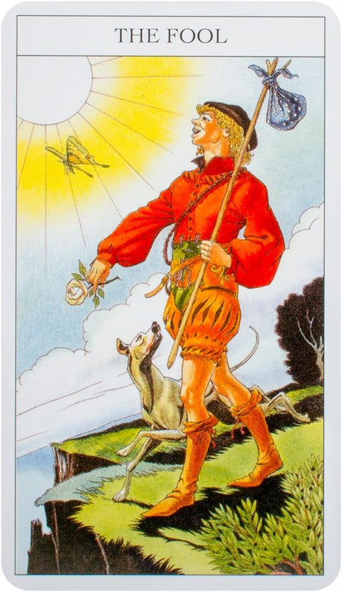 tarot korta Kvailys (Rider–Waite, stačia): žmogus raudonais drabužiais žengia nuo skardžio, šuo šalia