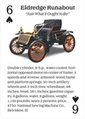 Senovinis automobilis Eldredge Runabout, juodas su oranžiniais ratlankiais, dviem sėdimomis vietomis, variklio ir priekinės dalies detalės iš trijų ketvirčių kampo