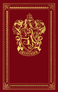Gryffindor rankšluostis tamsiai raudonas su auksiniu herbo piešiniu centre ir dekoratyviniu auksiniu rėmeliu